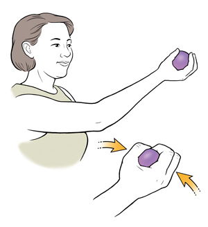Woman doing ball squeeze exercise.